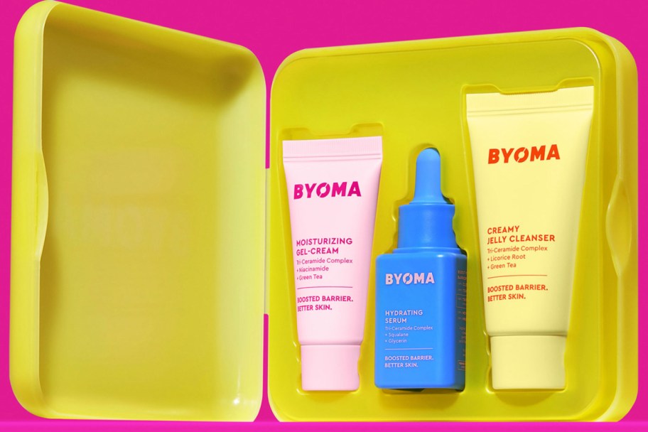 three skincare products in yellow case