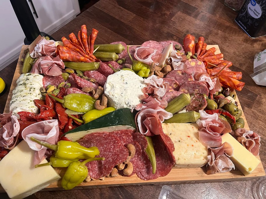Charcurterie board loaded with delicious things