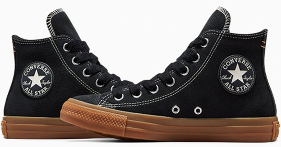 A pair of black Chuck Taylor All Star Suede