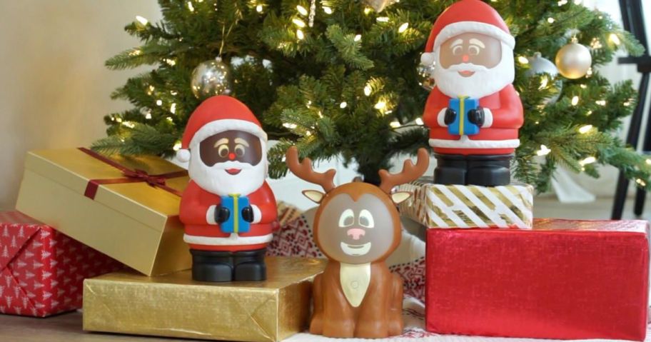 Cinemates Santas and Reindeer animated Christmas decorations under a tree
