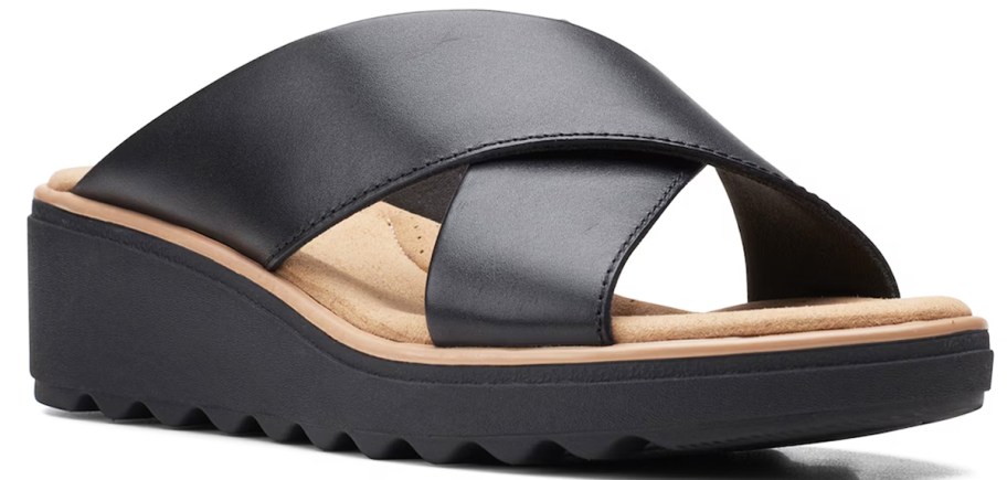 black sandal with thick criss-crossing straps