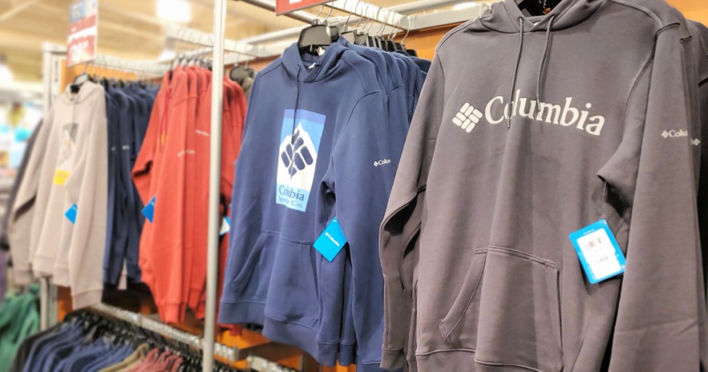 Columbia hoodies hanging on rack in store
