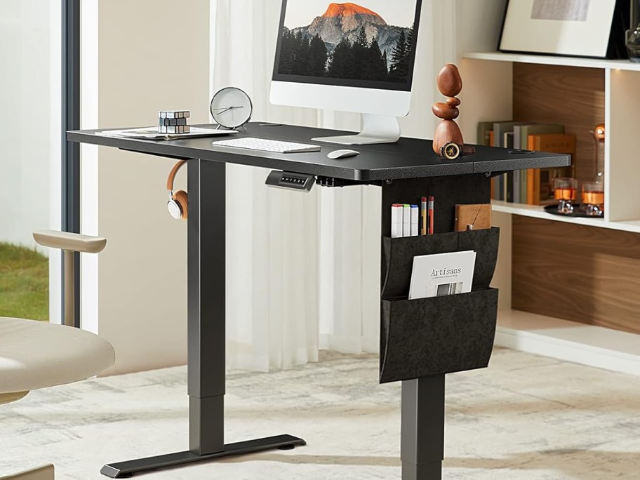 Electric standing adjustable table