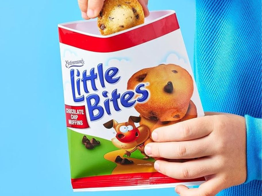 hand holding Entenmann's Little Bites Chocolate Chip Muffin bag