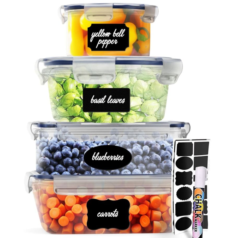 a food storage container set shown with label sheet and marker, and filled with fruits and vegetables on a kitchen counter