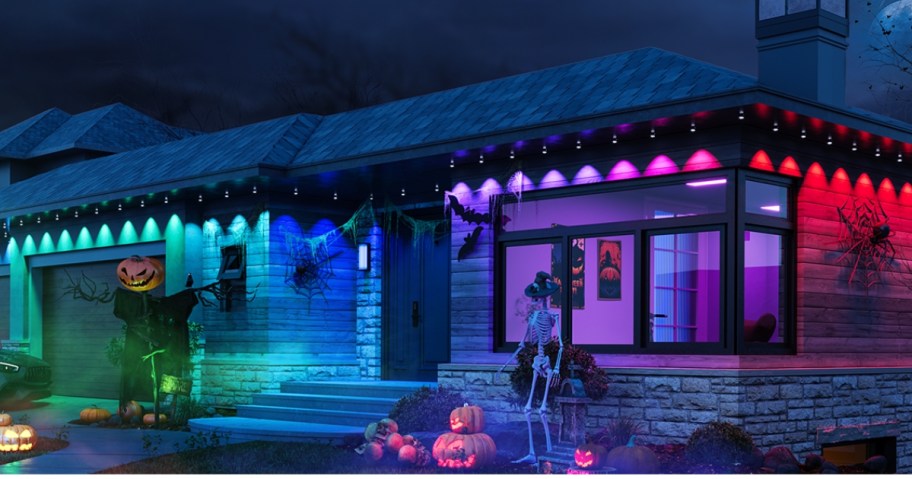 house with Halloween decorations and custom lights in various colors