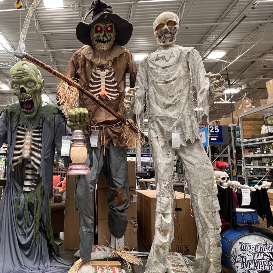 Halloween animatronics at Lowes - tall Mummy and Scarecrow