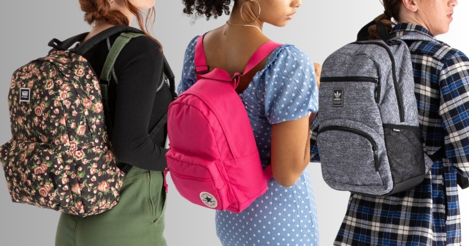 people wearing different styles of backpacks