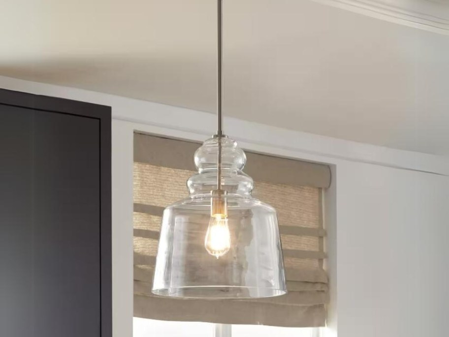 clear glass hanging pendant light in a kitchen