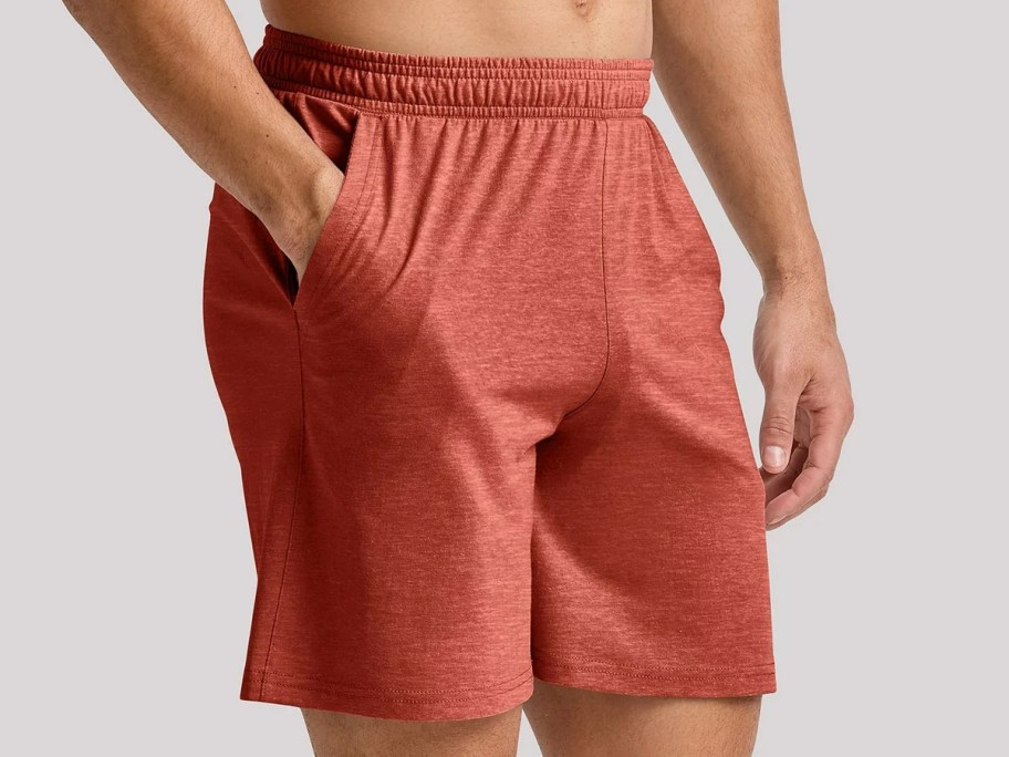 Man wearing Hanes Men’s Tri-Blend Jersey 7 inseam Shorts