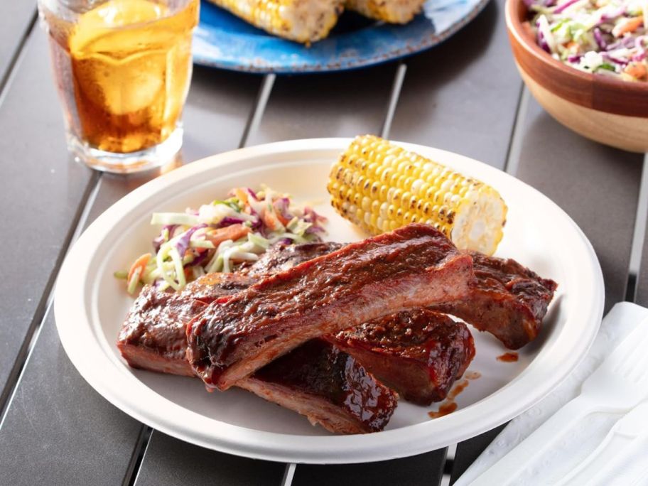 Ribs, corn on the cob and coleslaw on a Hefty Ecosave paper plate