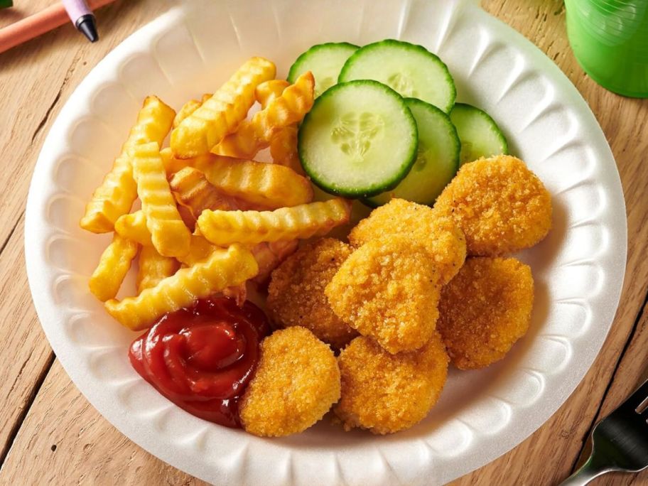 Hefty Everyday 9-Inch Foam Plate with chicken nuggets and fries on it