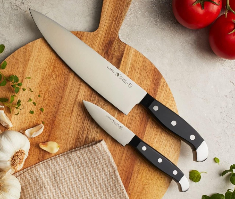 Henckels best Steak Knives on a cutting board