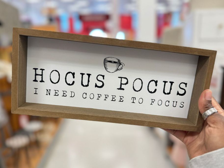 a wooden wall sign that reads hocus pocus i need coffee to focus