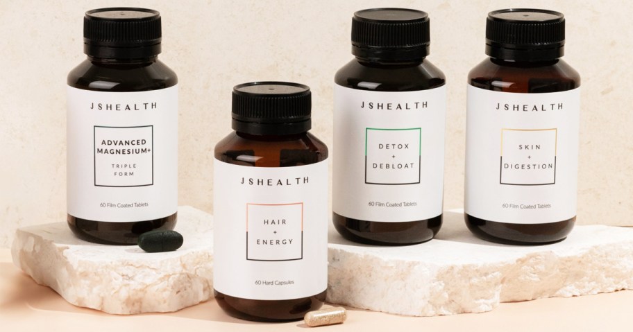four bottles of JSHealth supplements