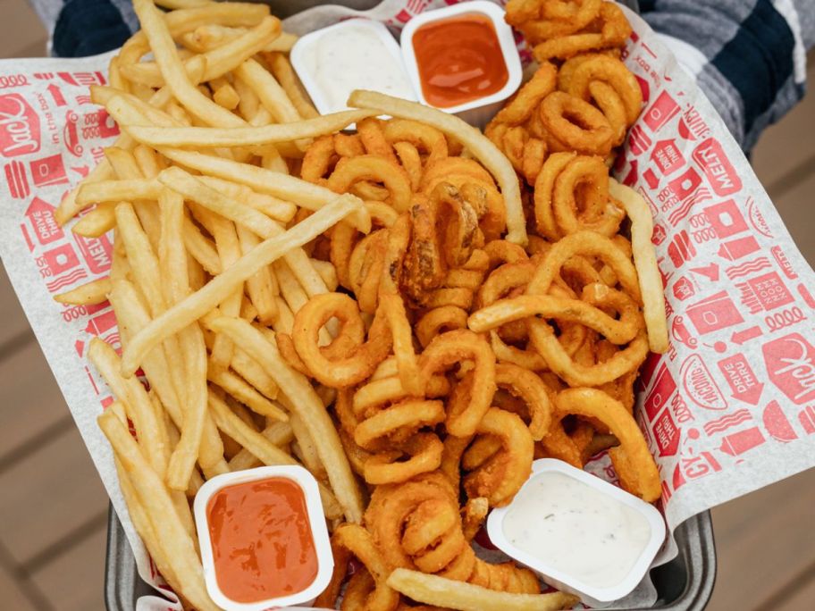 A platter of regular and curly fries from Jack in the box
