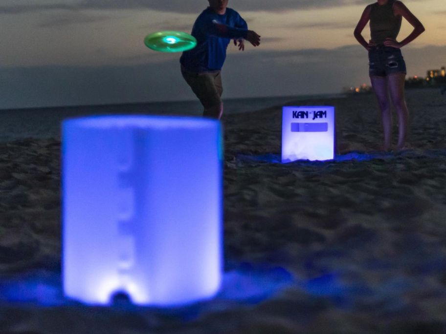 KanJam Illuminate Multi-Color LED Disc Game Set on beach