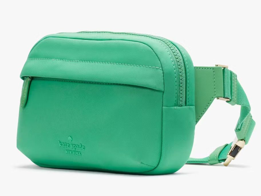 A green Kate Spade belt bag