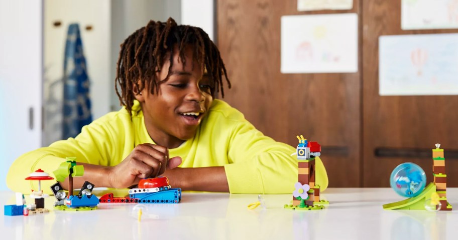 boy playing with LEGO Sonic the Hedgehog Sonic's Speed Sphere Challenge Playset