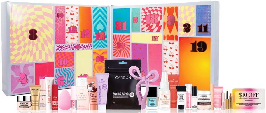 mini beauty products in front of an advent calendar