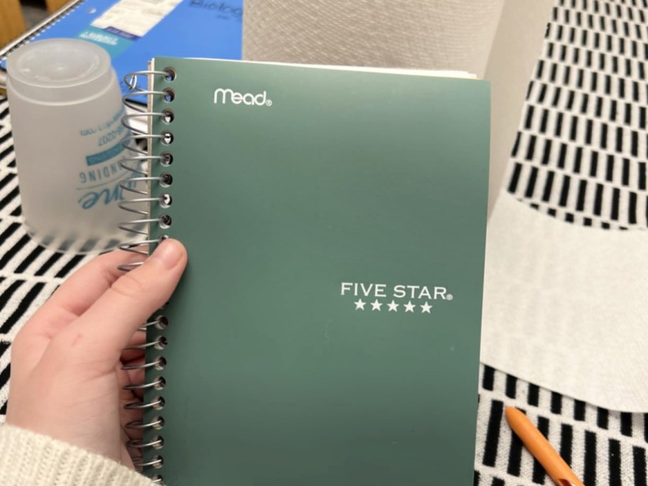 Green Mead Five Star Notebook in hand