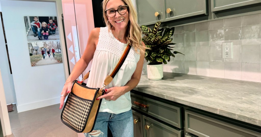 woman wearing montana west crossbody bag in kitchen