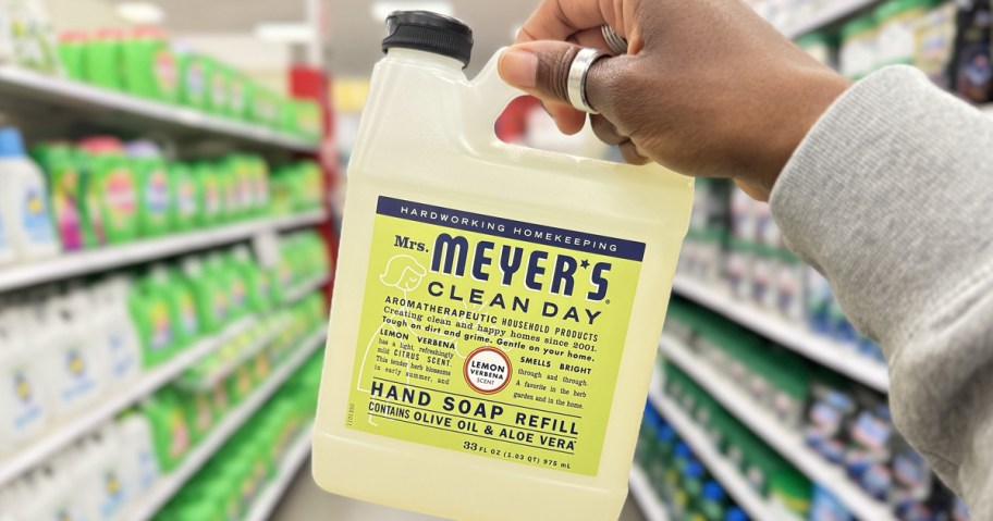 hand holding a Mrs. Meyer's Liquid Hand Soap Refill bottle in store