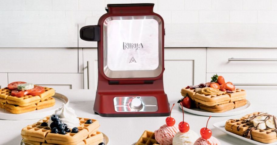 Ninja Vertical Nonstick Belgian Waffle Maker on counter with waffles around it