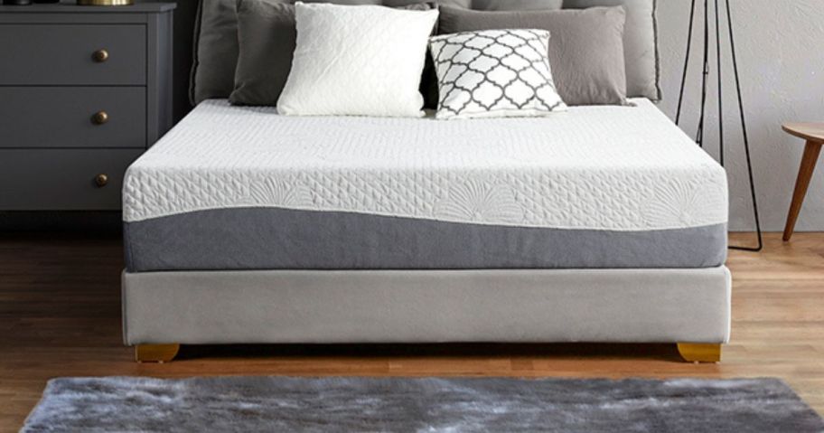 Olee Sleep 10 Inch Gel Layer Top Memory Foam Mattress in bedroom with pillows on it