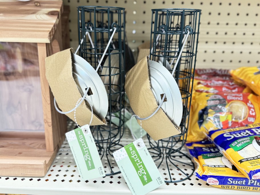 open wire bird feeders on store shelf