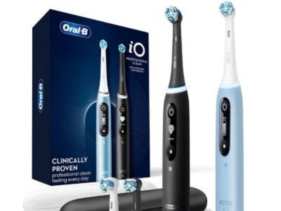Oral-B iO Series 7 Electric Toothbrush in Black Onyx & Aquamarine w/ 4 Brush Heads 2-Pack stock photo