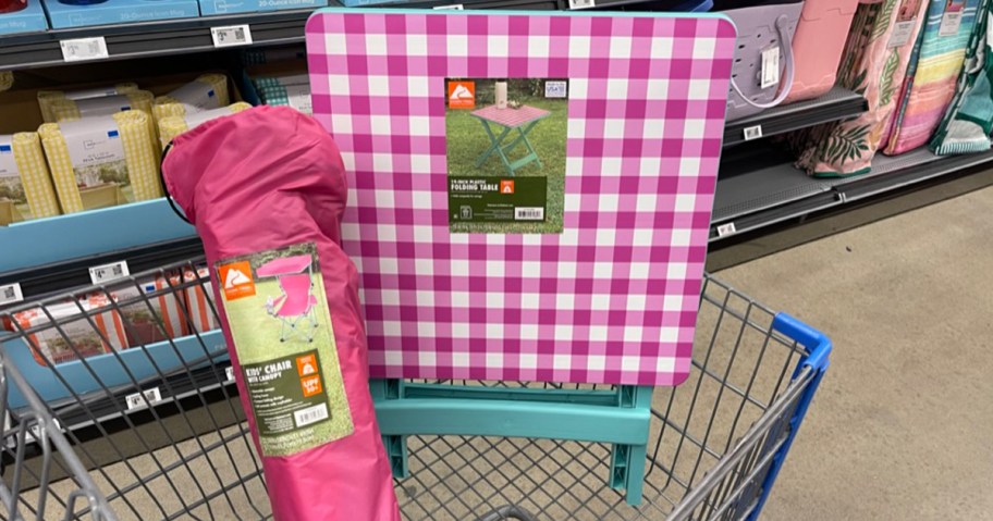 pink and white checkered print side table in cart with pink camp chair