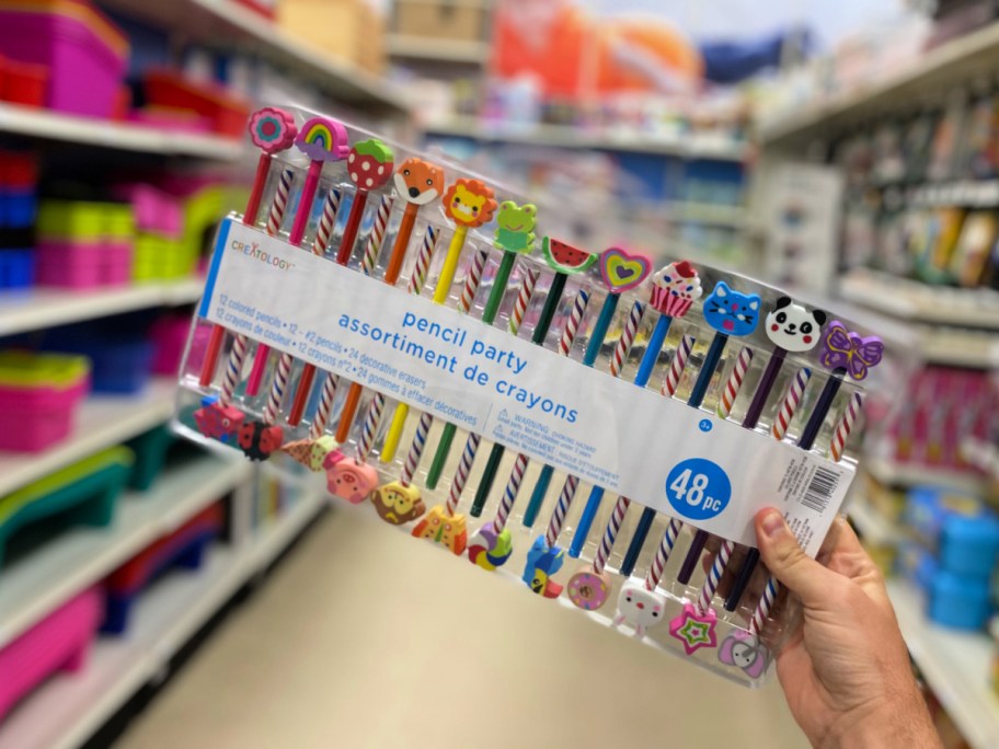 person holding Pencil Party Pack By Creatology in Michaels store