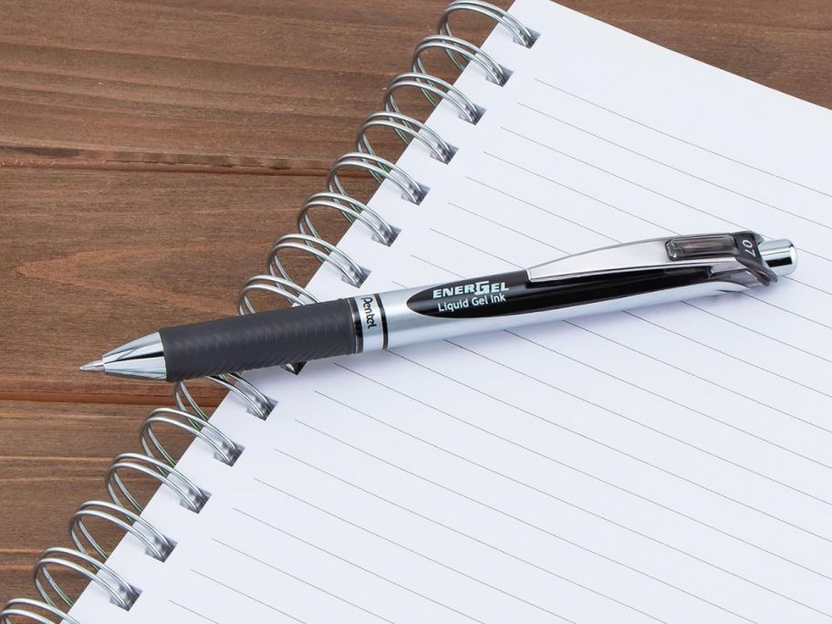 Pentel EnerGel RTX Retractable Liquid Gel Pen on notebook