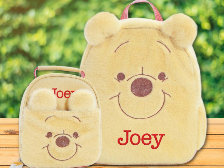 A pottery barn kids winnie the pooh backpack and lunch box
