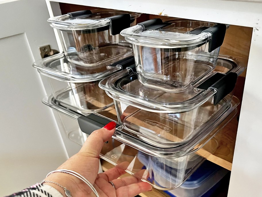 taking set of Rubbermaid Brilliance out of kitchen cabinet