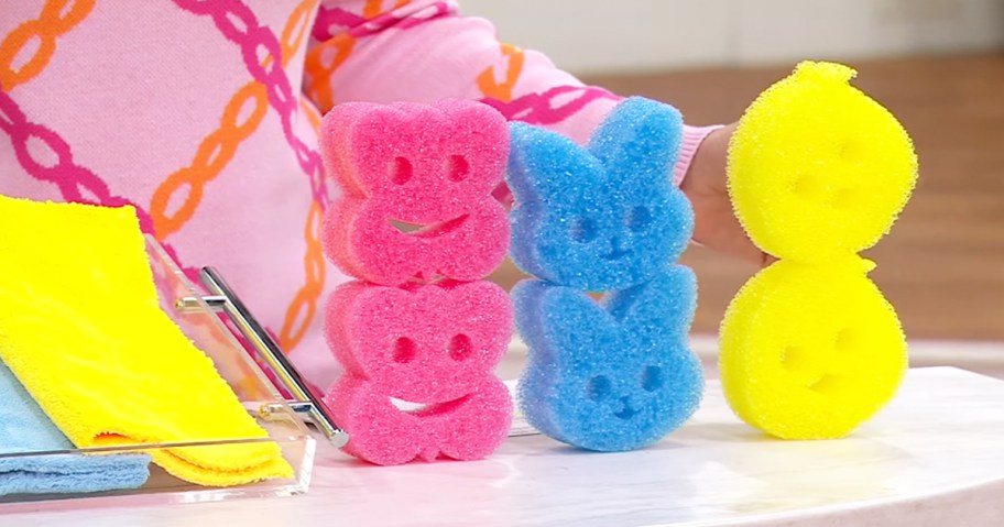 pink, blue, and yellow spring sponges on display