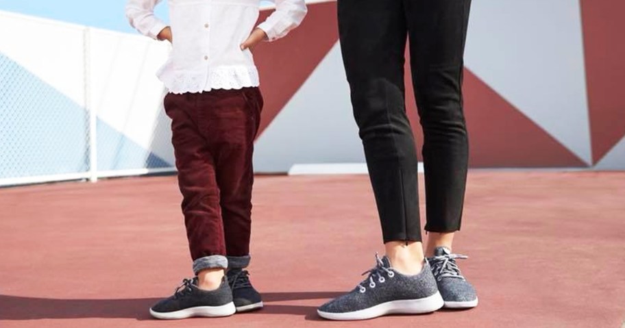 mom and daughter wearing matching shoes