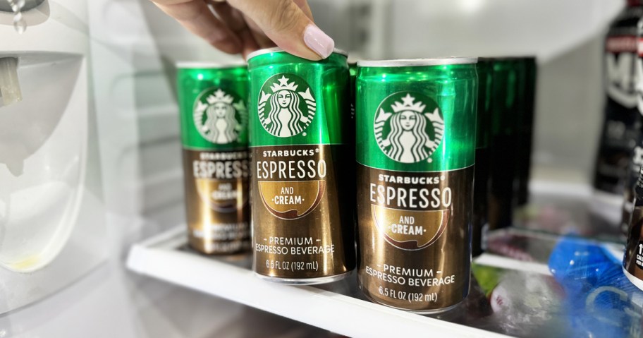 hand grabbing an Starbucks Ready to Drink Espresso & Cream Coffee from fridge