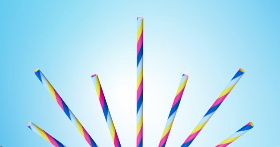 starbucks straws in striped colors with blue background