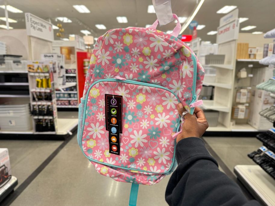 A backpack with a floral print 