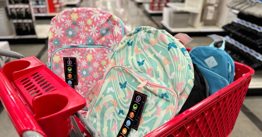 Several backpacks in a cart at Target