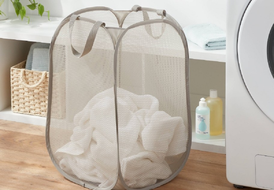 Target mesh brown hamper with laundry inside