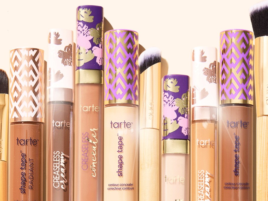 tarte concealers and brushes in a row