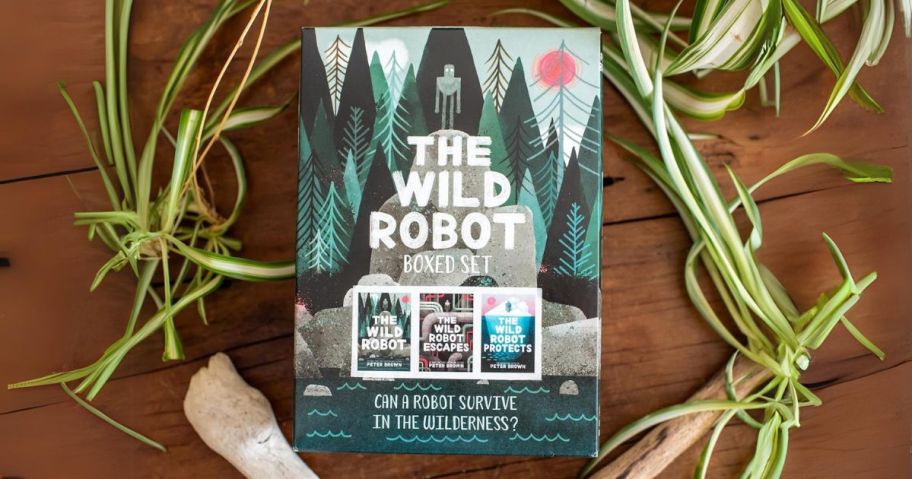 The Wild Robot Boxed Set by Peter Brown on table