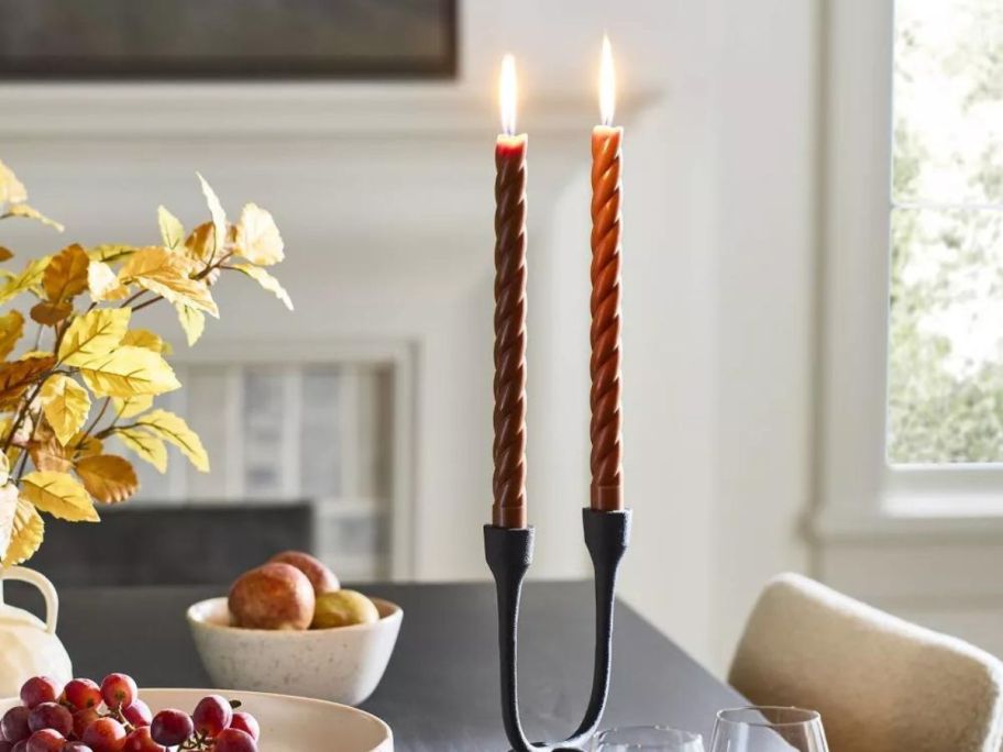 Threshold Designed w/ Studio McGee 4-Pack Taper Set Twist Candles in holders on dining room table