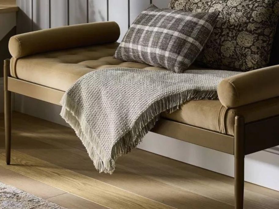 Threshold Designed w/ Studio McGee Brown / Cream Woven Textural Throw on bench in entryway
