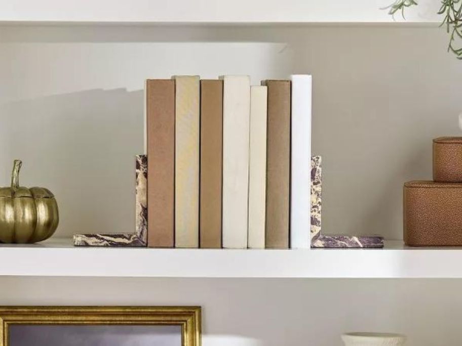 books in between Threshold Designed w/ Studio McGee Decorative Set of 2 Levanto Bookends on shelf
