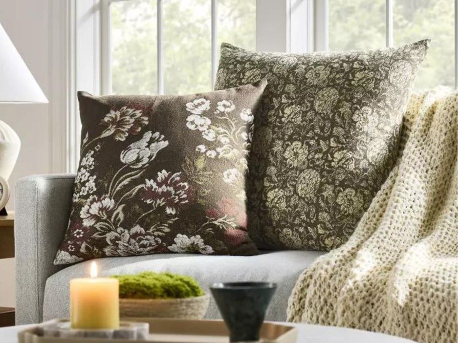 Threshold Designed w/ Studio McGee Oversized Printed Floral Square Throw Pillow on couch in living room
