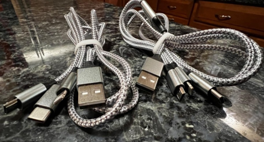 Two charging cables displayed on top of a table